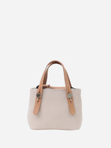 プチレザートートバッグ 限定カラーの桜ピンク× ヌードヌメハンドル